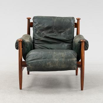 An 'Amiral' rosewood easy chair by Eric Merthen for IRE, 1960's.