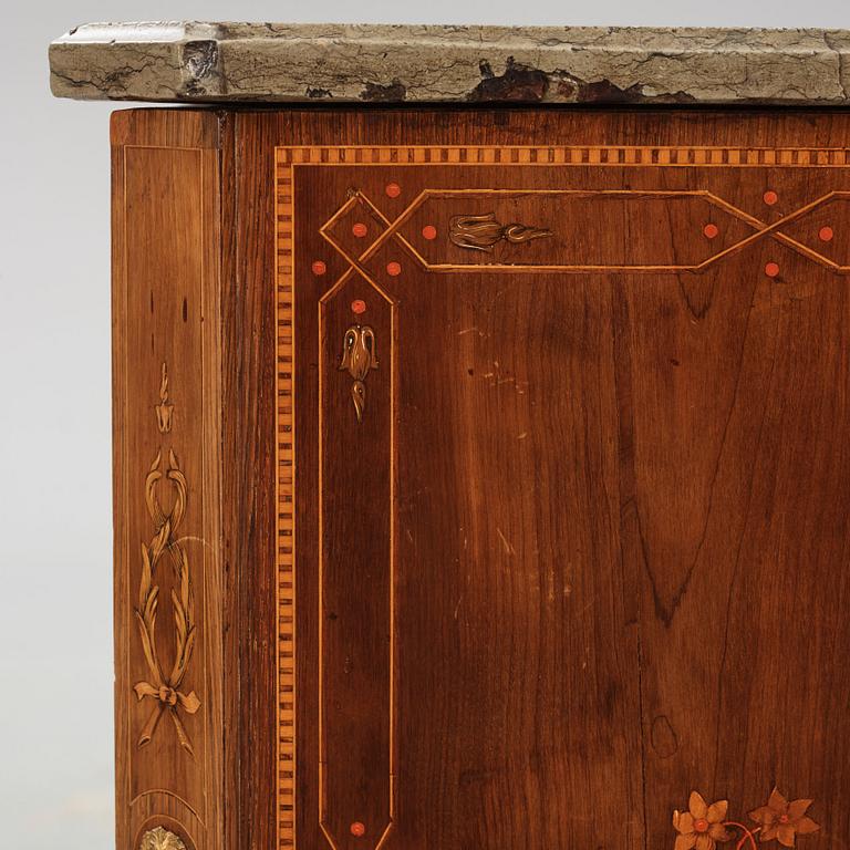 A Gustavian marquetry and ormolu-mounted commode by N. P. Stenström (master in Stockholm 1782 - 90).