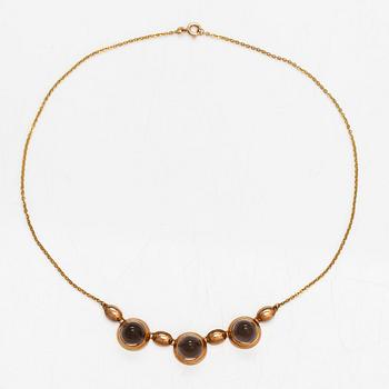 Elis Kauppi, A 14K gold necklace with smoky quartzes. Kupittaan kulta, Turku 1960.