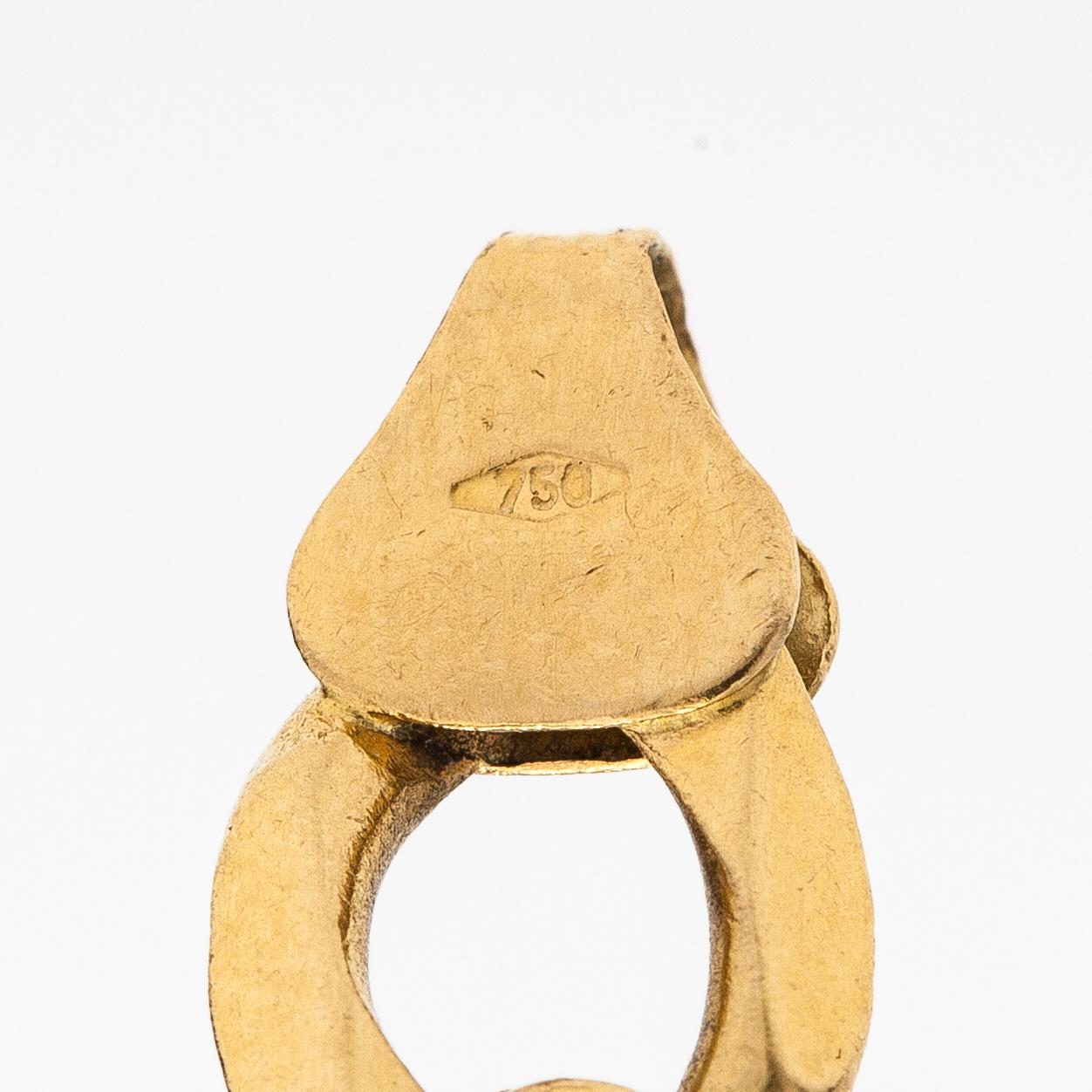 An 18K gold necklace. Unoaerre, Italy.