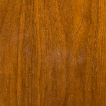 A 1960s teak and oak dining table.