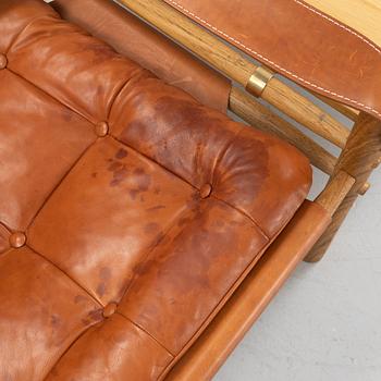 Arne Norell, fåtöljer, ett par med bordsskiva, "Sirocco", Norell Möbel AB.