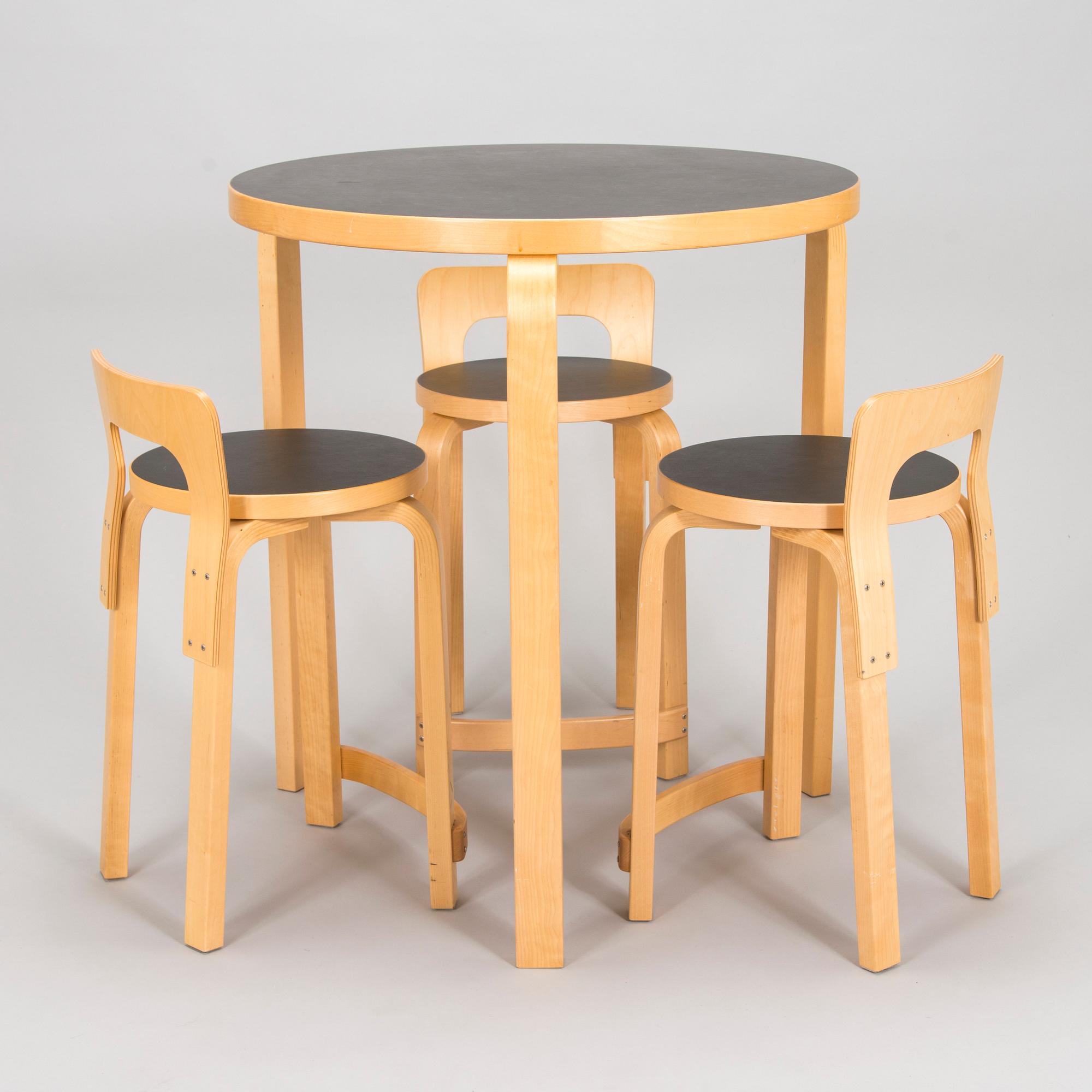 Alvar Aalto, a table and three chairs, Artek 2006 and 2007.