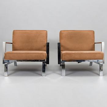 A pair of  21st century armchairs for Innovation.