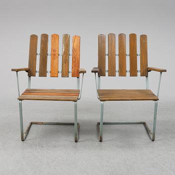 A pair of Grythyttan garden chairs.