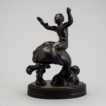 A JUST ANDERSEN sculpture.