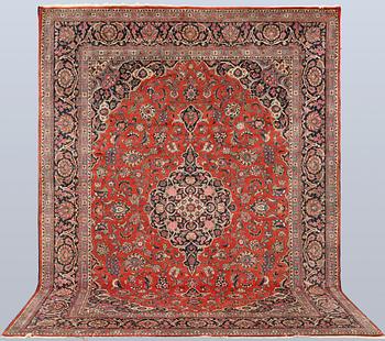 A semi-antique Keshan carpet, approx. 370 x 272 cm.