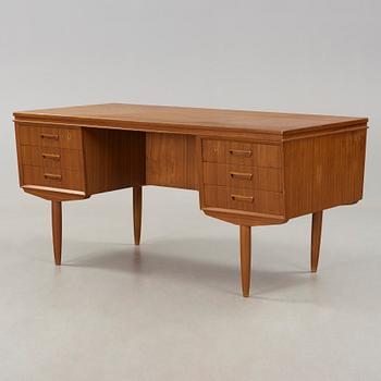 A second half of the 20th century teak desk.