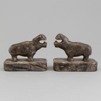 A pair of stone book ends, early 20th century.