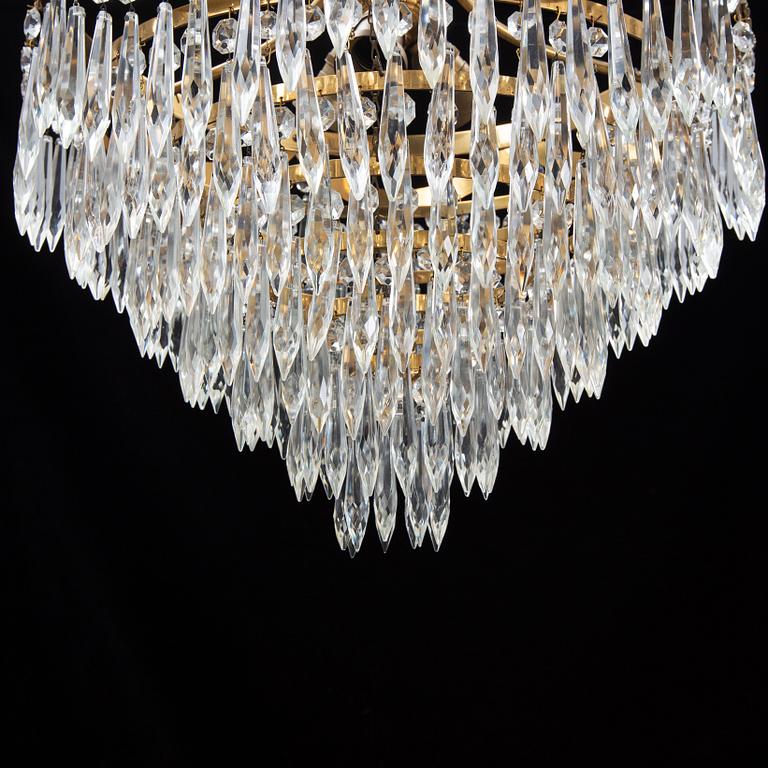 An end of the 20th Century ceiling light with prisms.