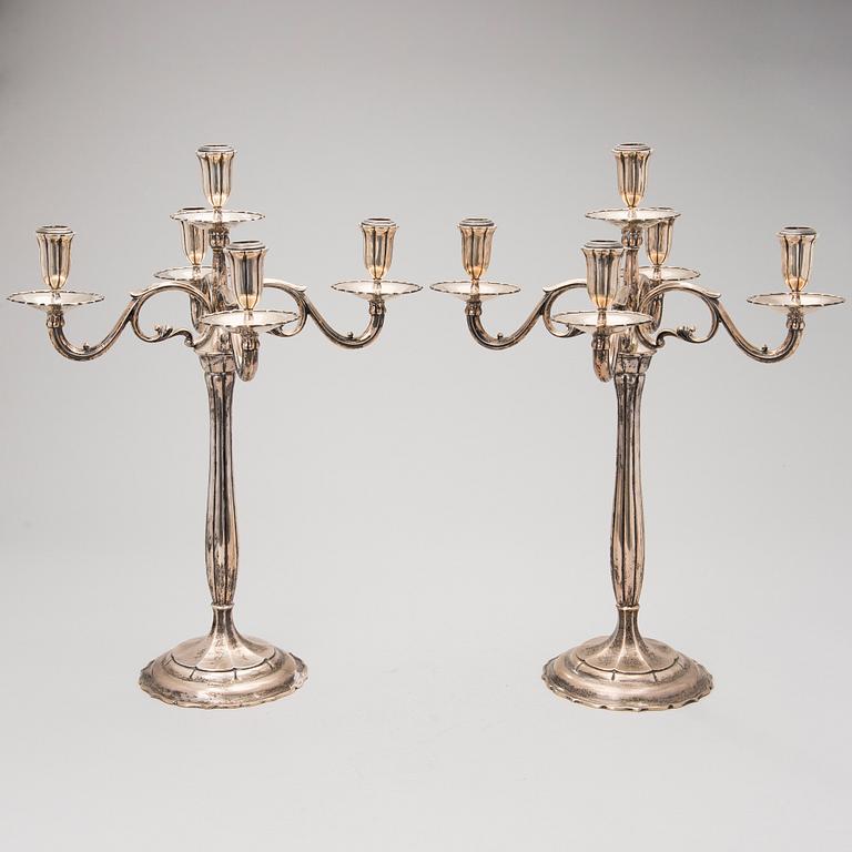 A PAIR OF SILVER CANDELABRAS, finsh import marks Helsinki 1926.