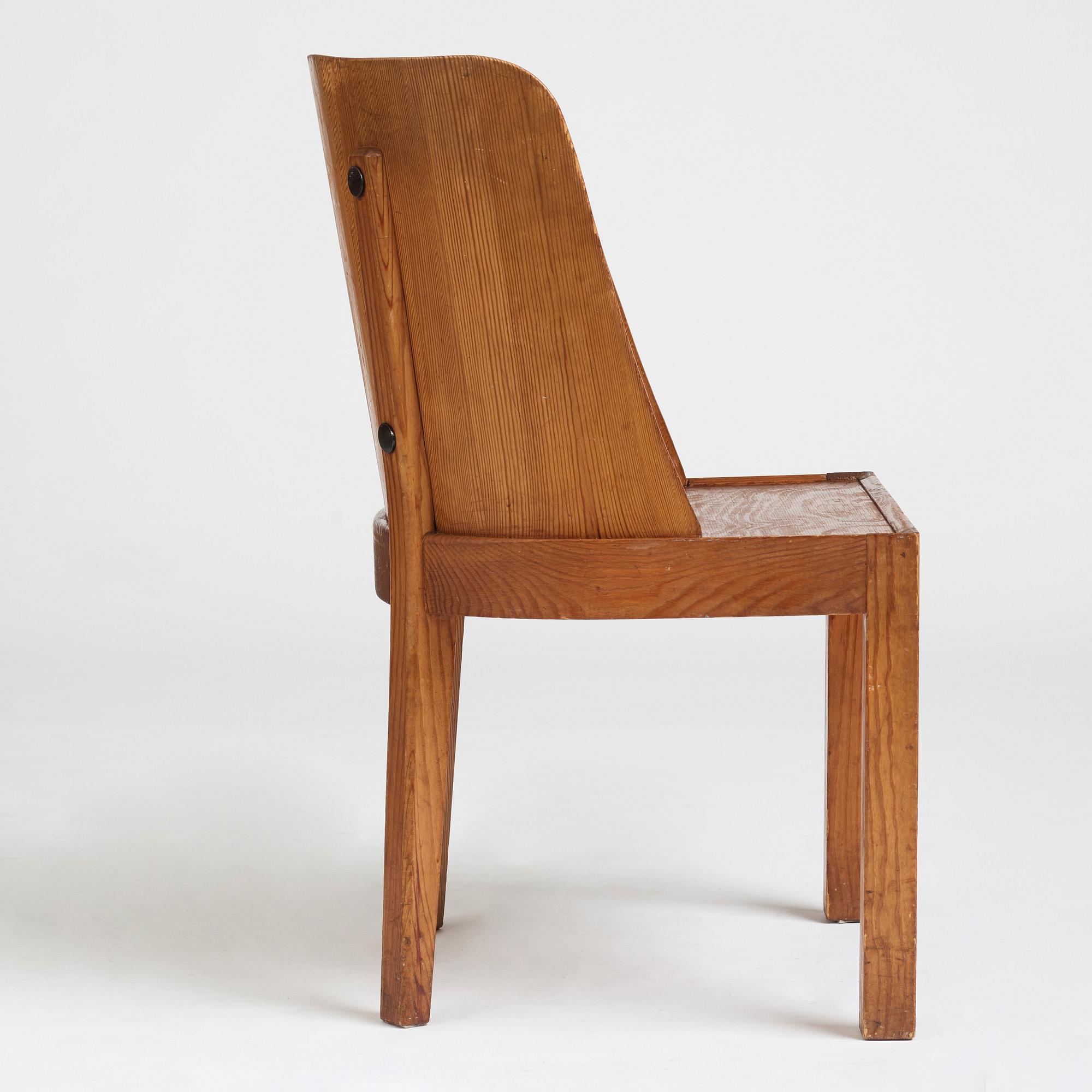Axel Einar Hjorth, a stained pine low back "Lovö" chair, Nordiska Kompaniet, Sweden 1930's.