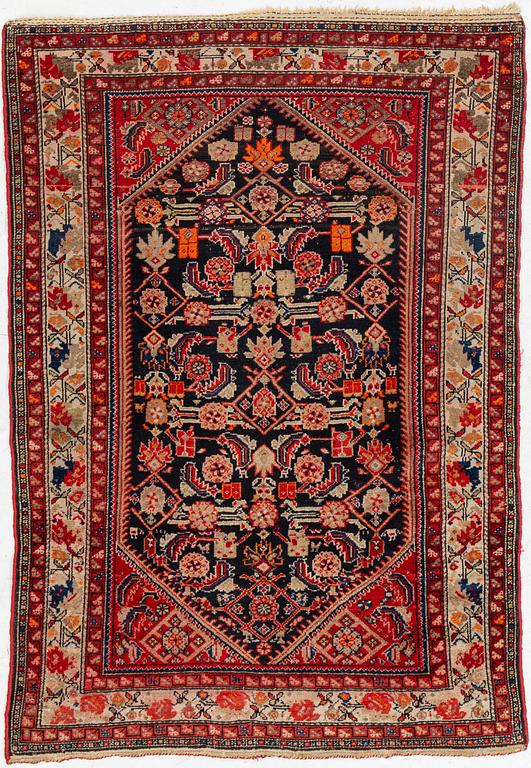 An oriental rug, approx. 148 x 110 cm.