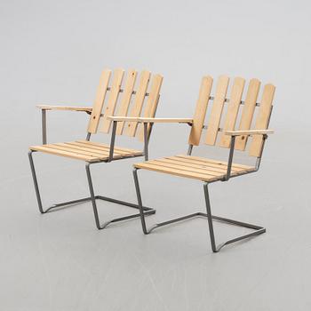 Arthur Lindqvist, Armchairs, a pair, model A2, Grythyttan 20th century.