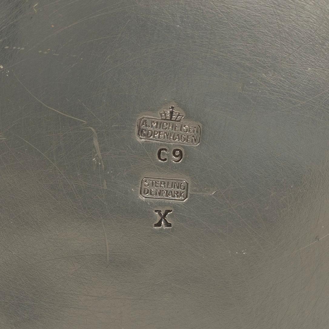 Three silver beakers, a vase and a cup, Sweden and Denmark, 19th-20th century.