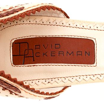 DAVID ACKERMAN, a pair of beige and brown pumps. Size 38.