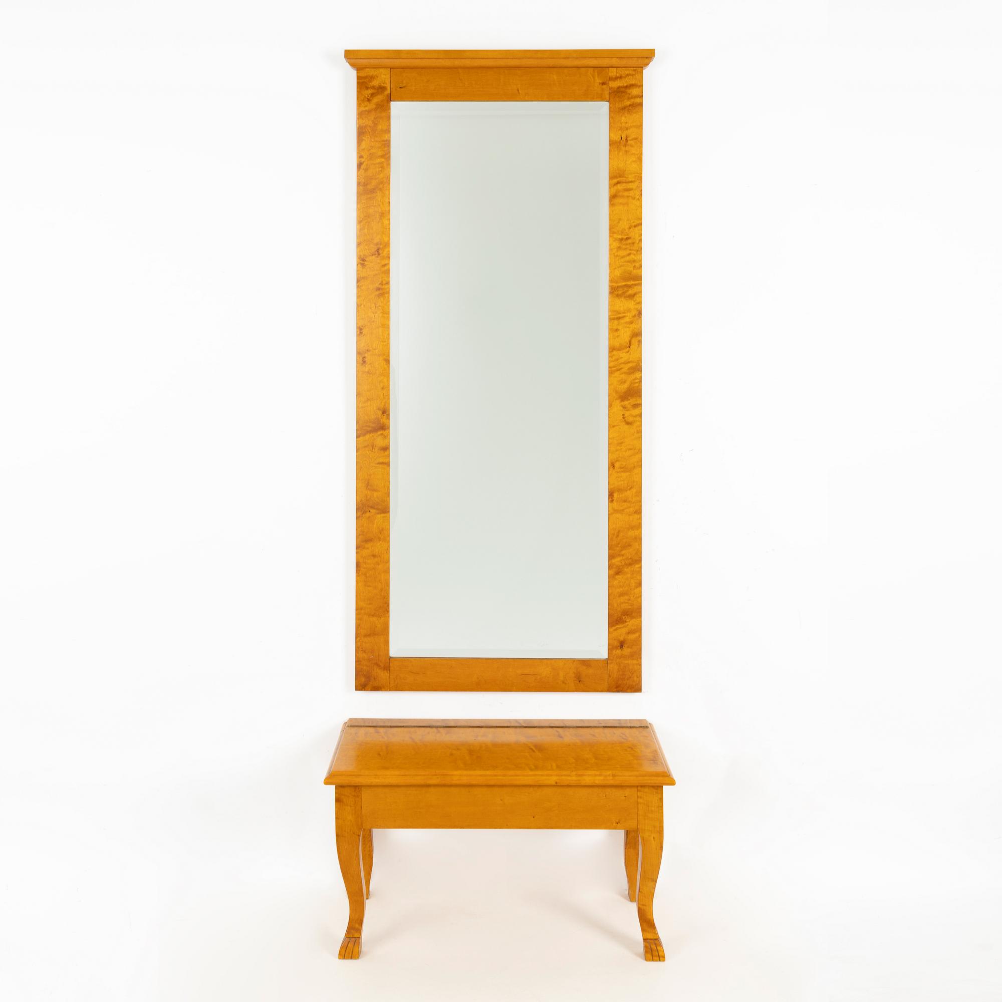 A mirror with console table, early 20th century.