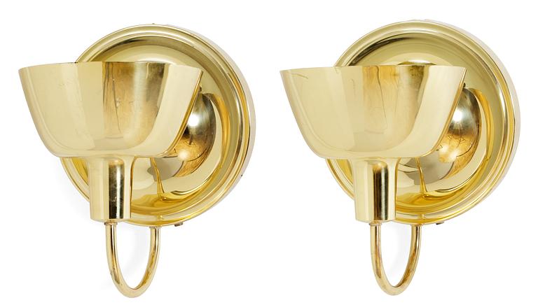 A pair of Josef frank brass wall lamps, Firma Svenskt Tenn.
