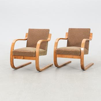 Alvar Aalto, armchairs, a pair, no. 34/402. Oy Huonekalu- ja Rakennustyötehdas Ab, 1940s.