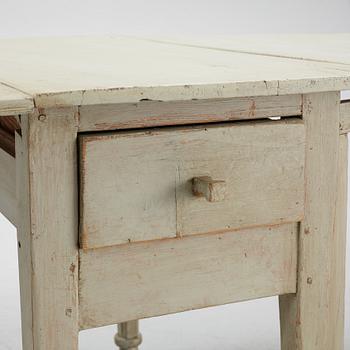 A painted gate-leg table, 19th century.