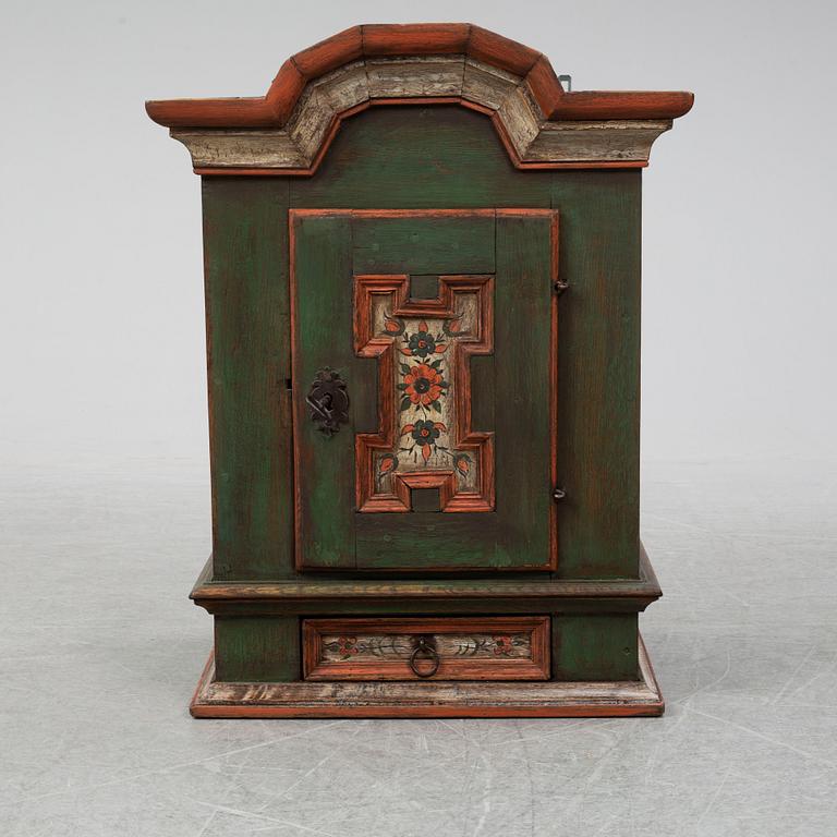 A 18/19th Century painted wall cabinet.