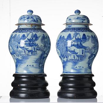 A pair of large blue and white vases with covers, Qing dynasty, Qianlong (1736-95).