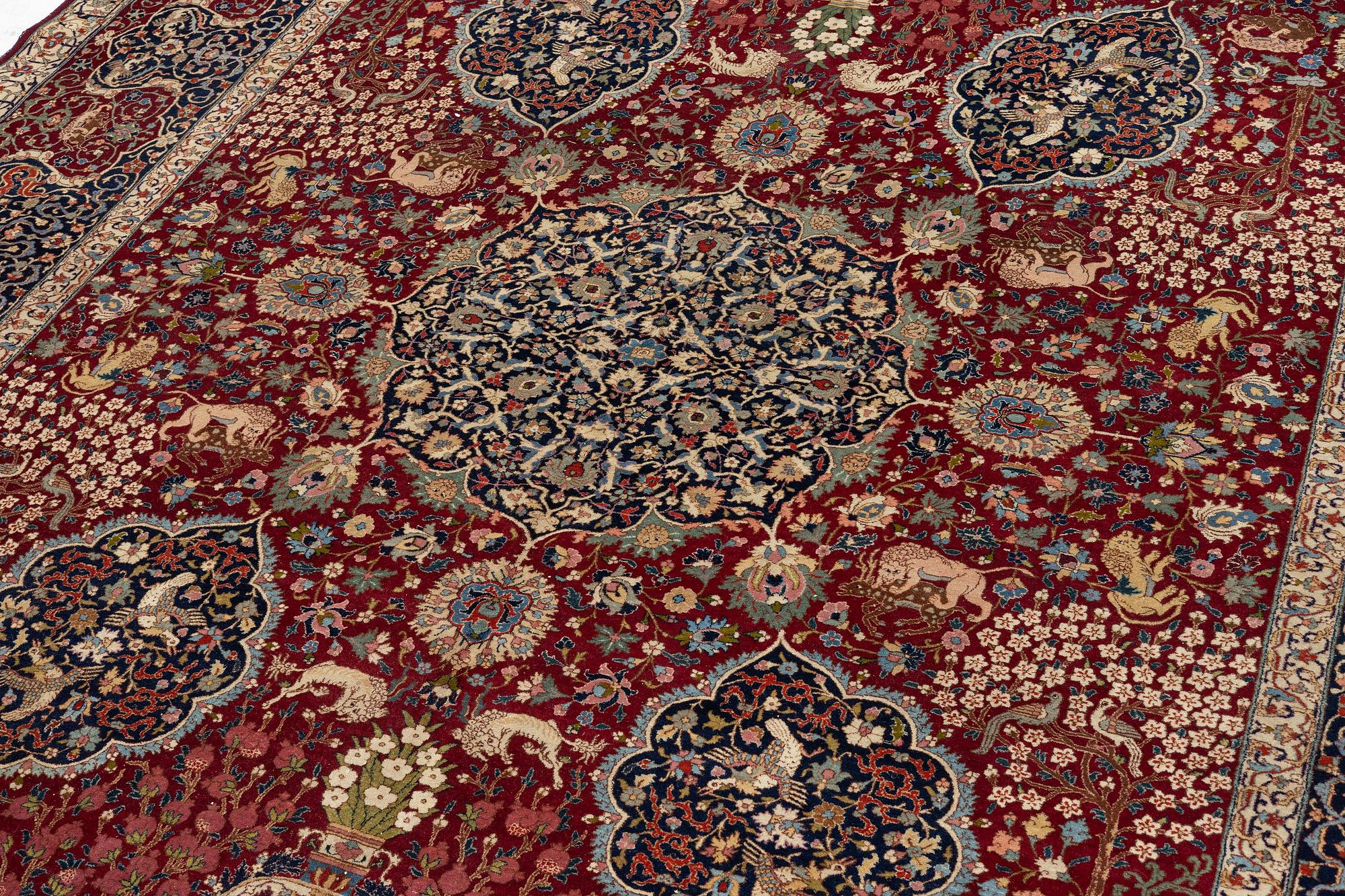 A semi-antique Benlian Tabriz carpet, signed Jabarzade, c. 416 x 308 cm.