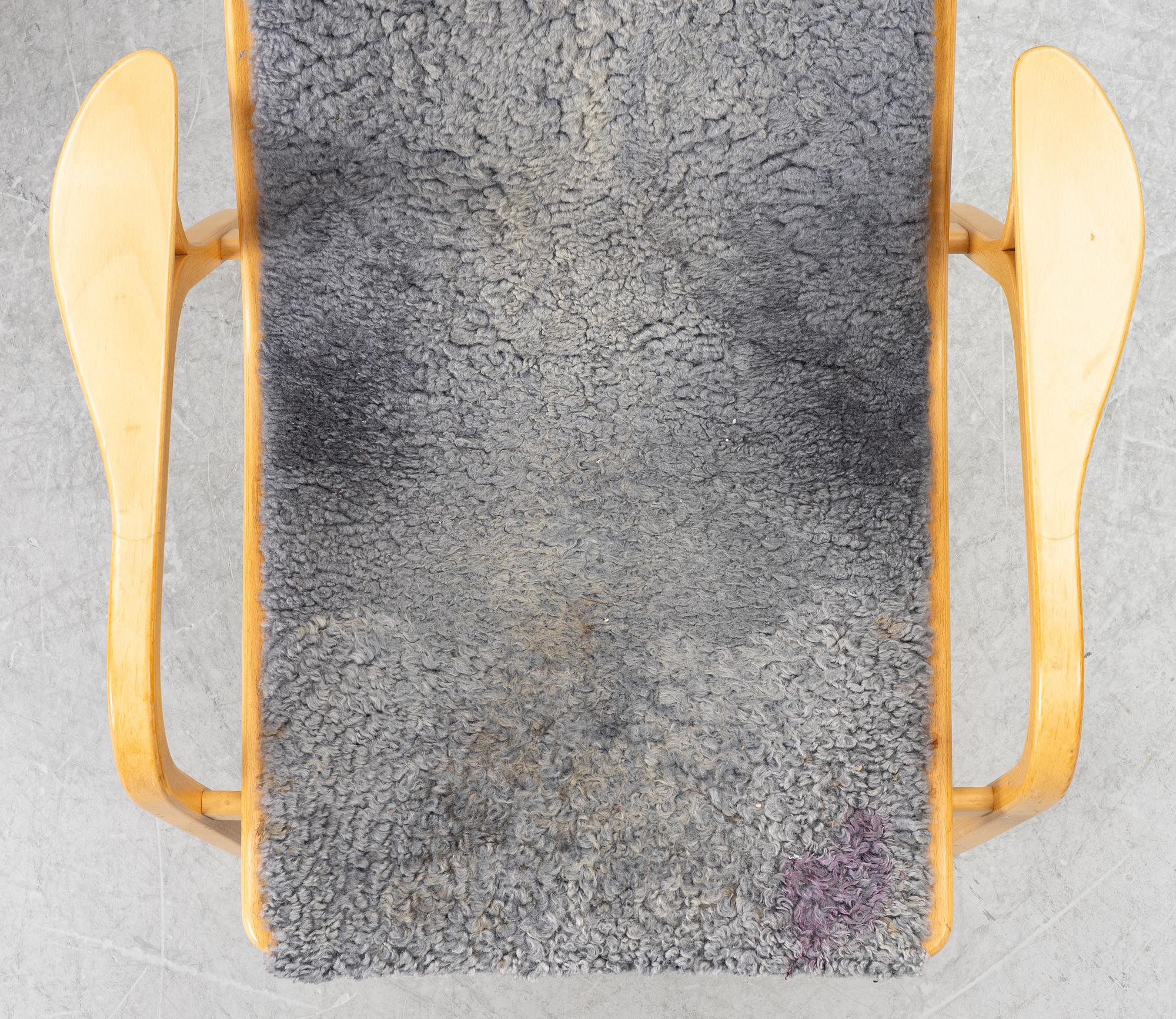 Yngve Ekström, a pair of 'Lamino' easy chairs, Swedese 2004.