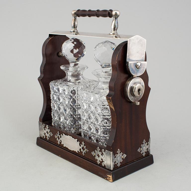 A BOTTLE HOLDER FOR TWO BOTTLES. 20th CENTURY.