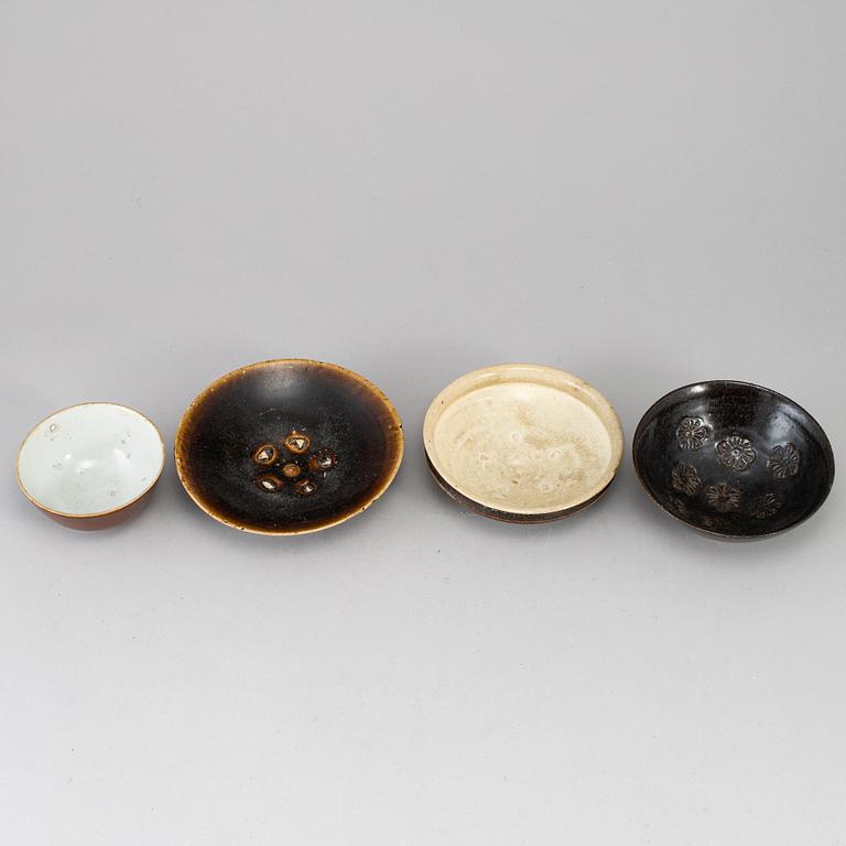 A group of four Southeast asian ceramic bowls and deep dishes, presumably 16/17th century.