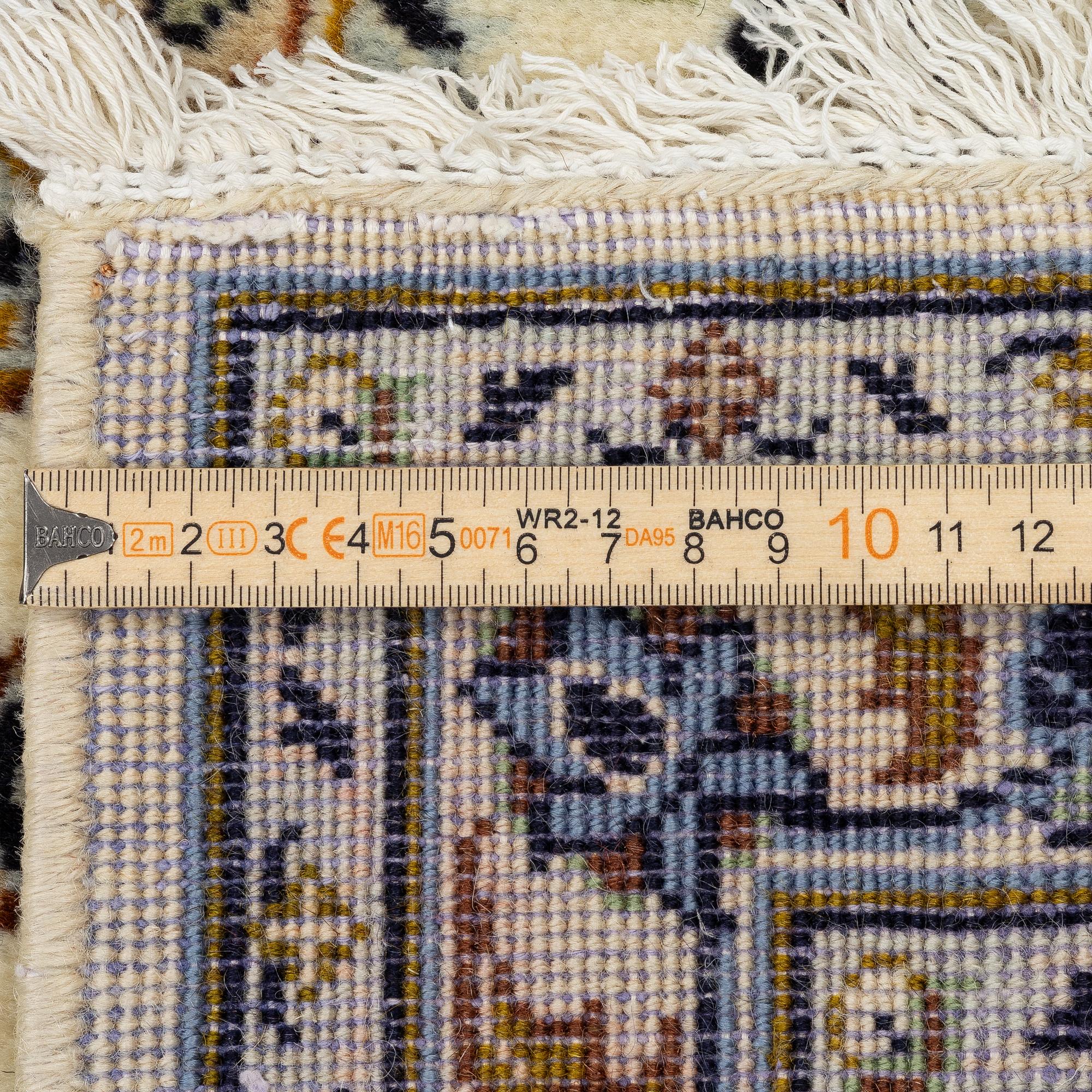 A Keshan carpet, central Iran, c. 345 x 240 cm.