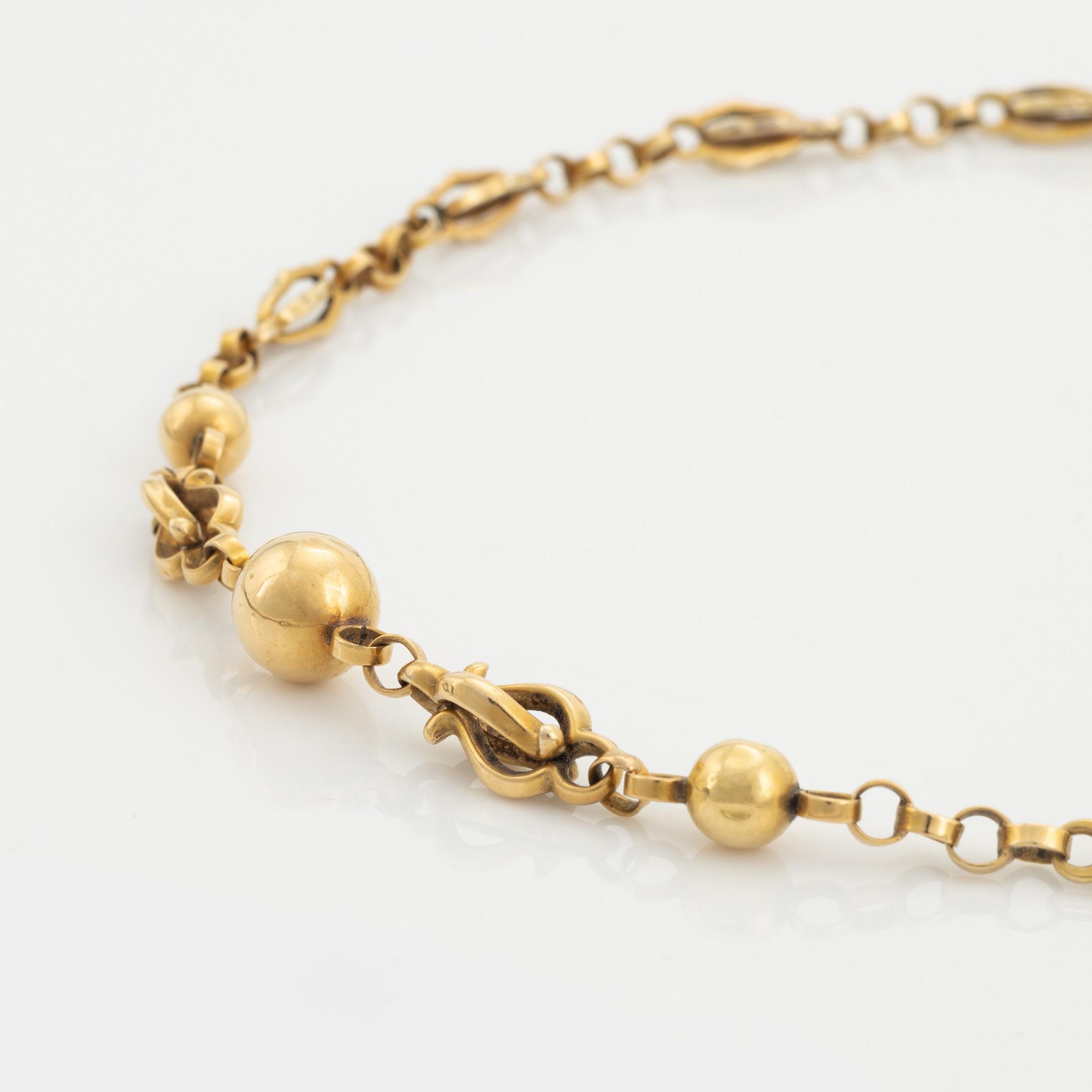 18K gold necklace.