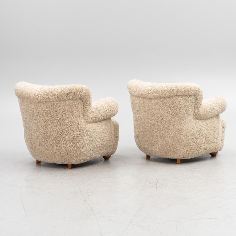 A pair of Swedish Modern armchairs, mid-20th Century.