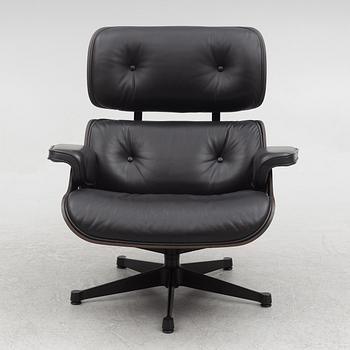 Charles & Ray Eames, an "Eames Lounge Chair" with ottoman, Vitra, 21st century.