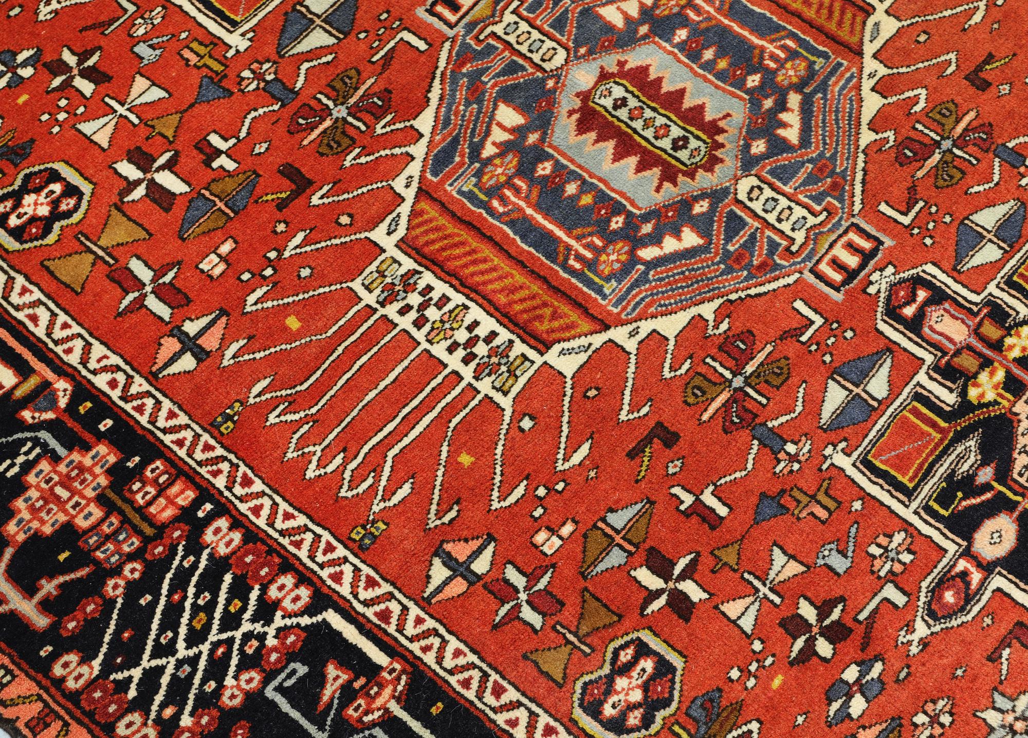 A Heris rug, approx. 191 x 157 cm.