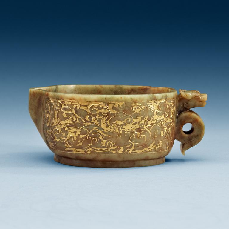 An archaistic carved and gilded vessel, Qing dynasty.