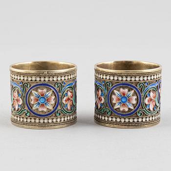 A Pair of Silver and Enamel Napkin Rings and Spoon, Russia 1896-1926.