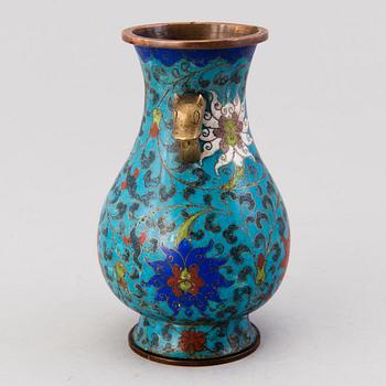 A Chinese cloisonné vase of the Ming dynasty.