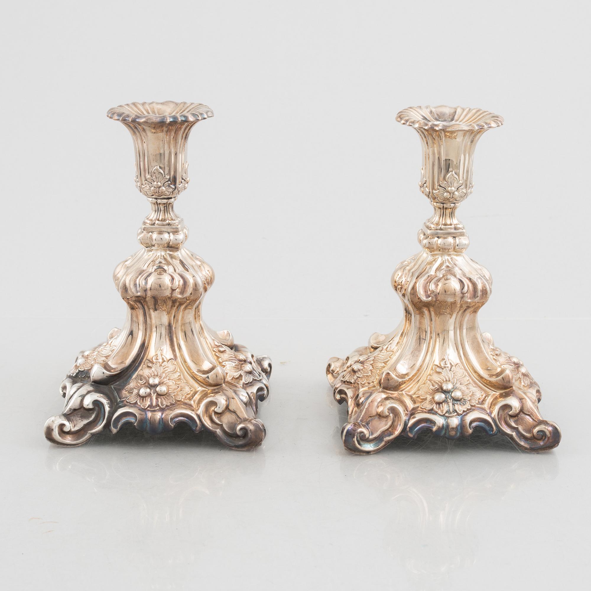 A pair of Baroque style silver candlesticks, Swedish import mark, 20th Century.