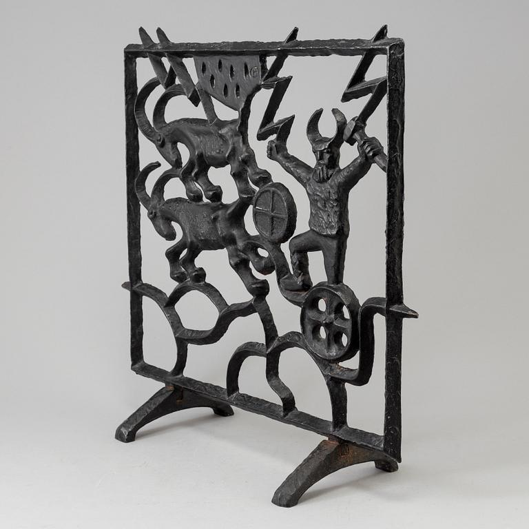A cast iron fire shield by Olle Hermansson, Husqvarna.