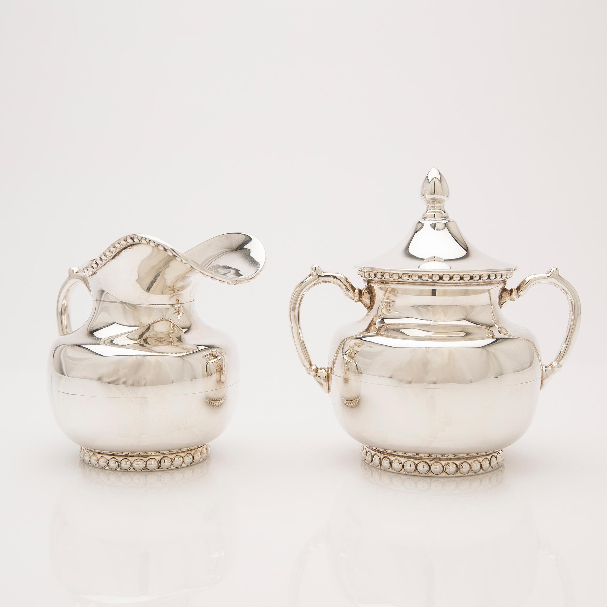 Creamer and sugar bowl with lid, sterling silver, Mexico.