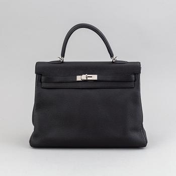 Hermès, a 'Kelly 35' black leather bag, 2017.