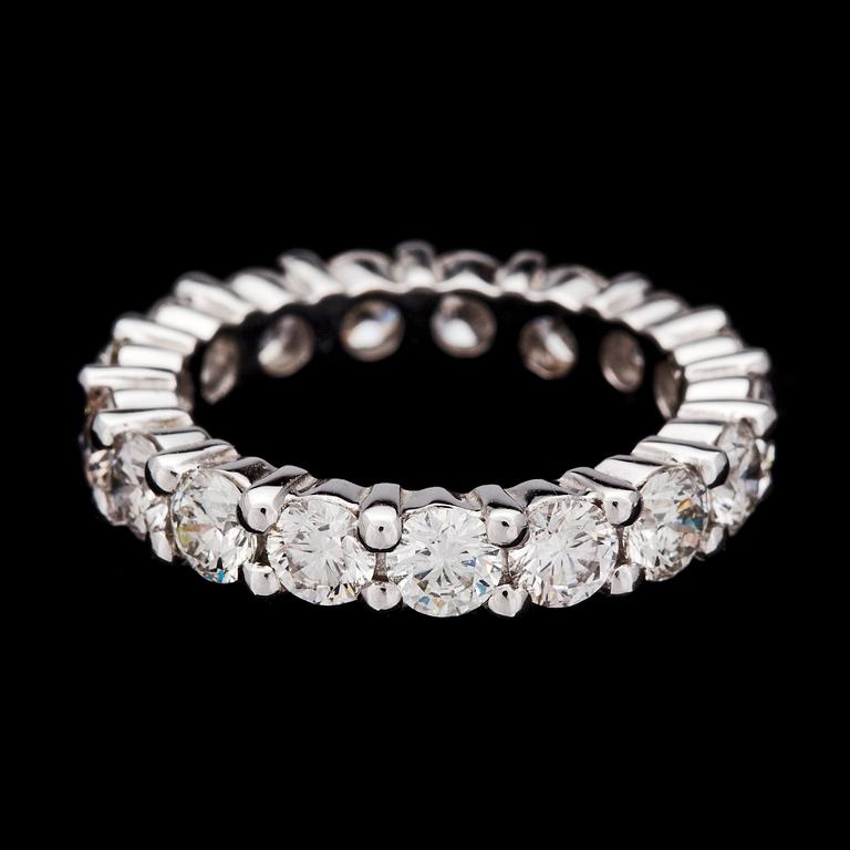 A brilliant cut diamond eternity ring, tot. 3.40 cts.