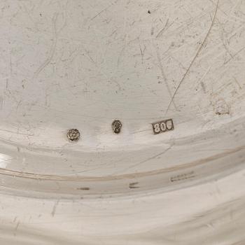 A silver serving platter, and six similar coasters, Austria-Hungary 1867-1922 and Czechoslovakia 1949-1962.