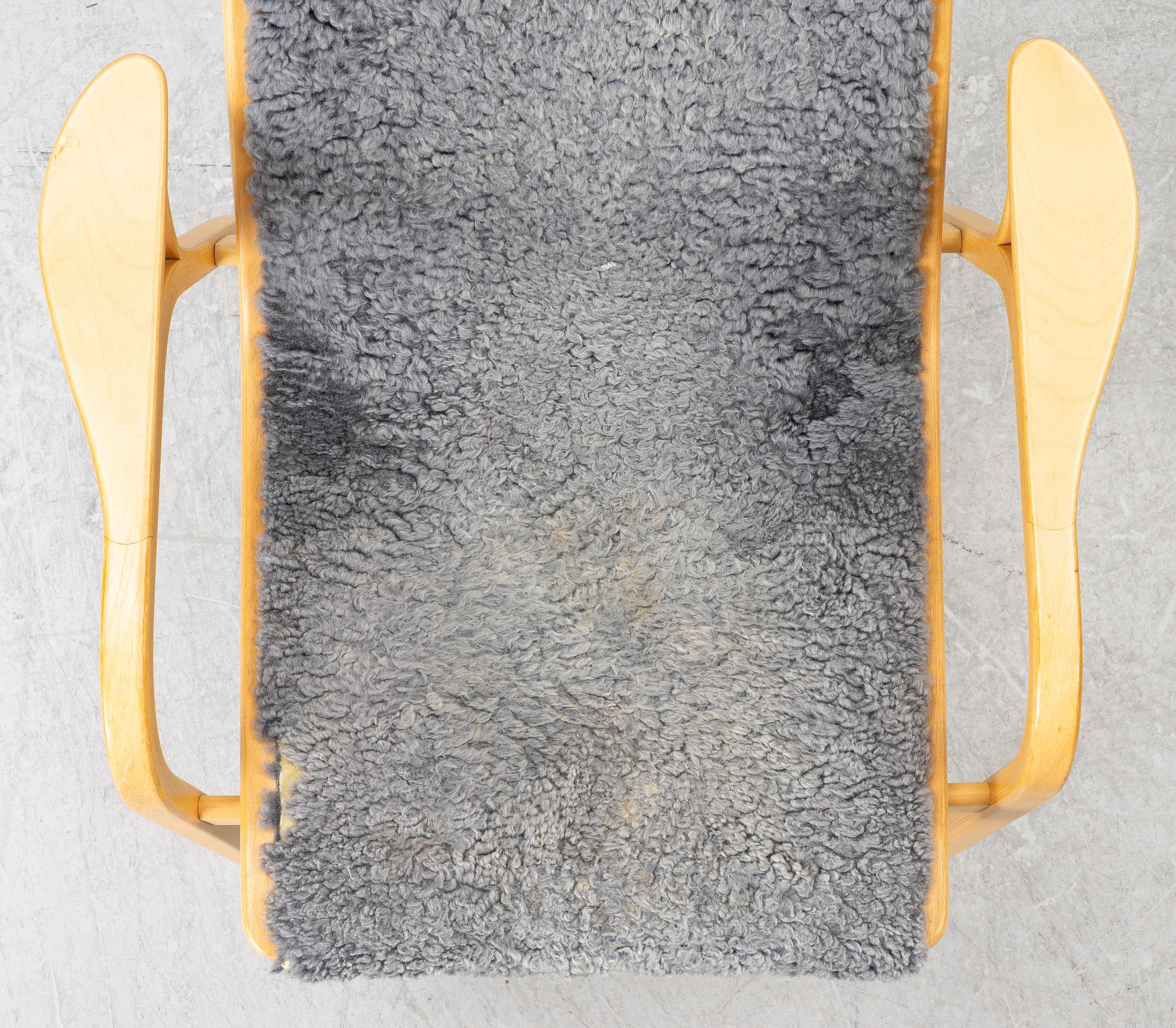 Yngve Ekström, a pair of 'Lamino' easy chairs, Swedese 2004.