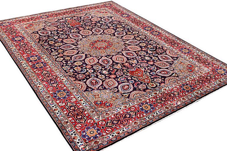 A Meshed carpet, c. 352 x 255 cm.