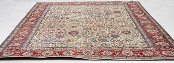 A Tabriz carpet, c. 385 x 287 cm.
