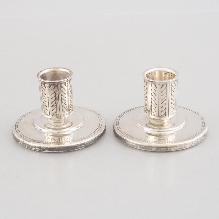 A pair of silver candlesticks, marks of W.A. Bolin, Stockholm, Sweden 1941.