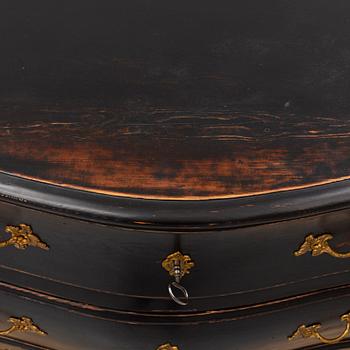 A 1700's rococo chest of drawers.