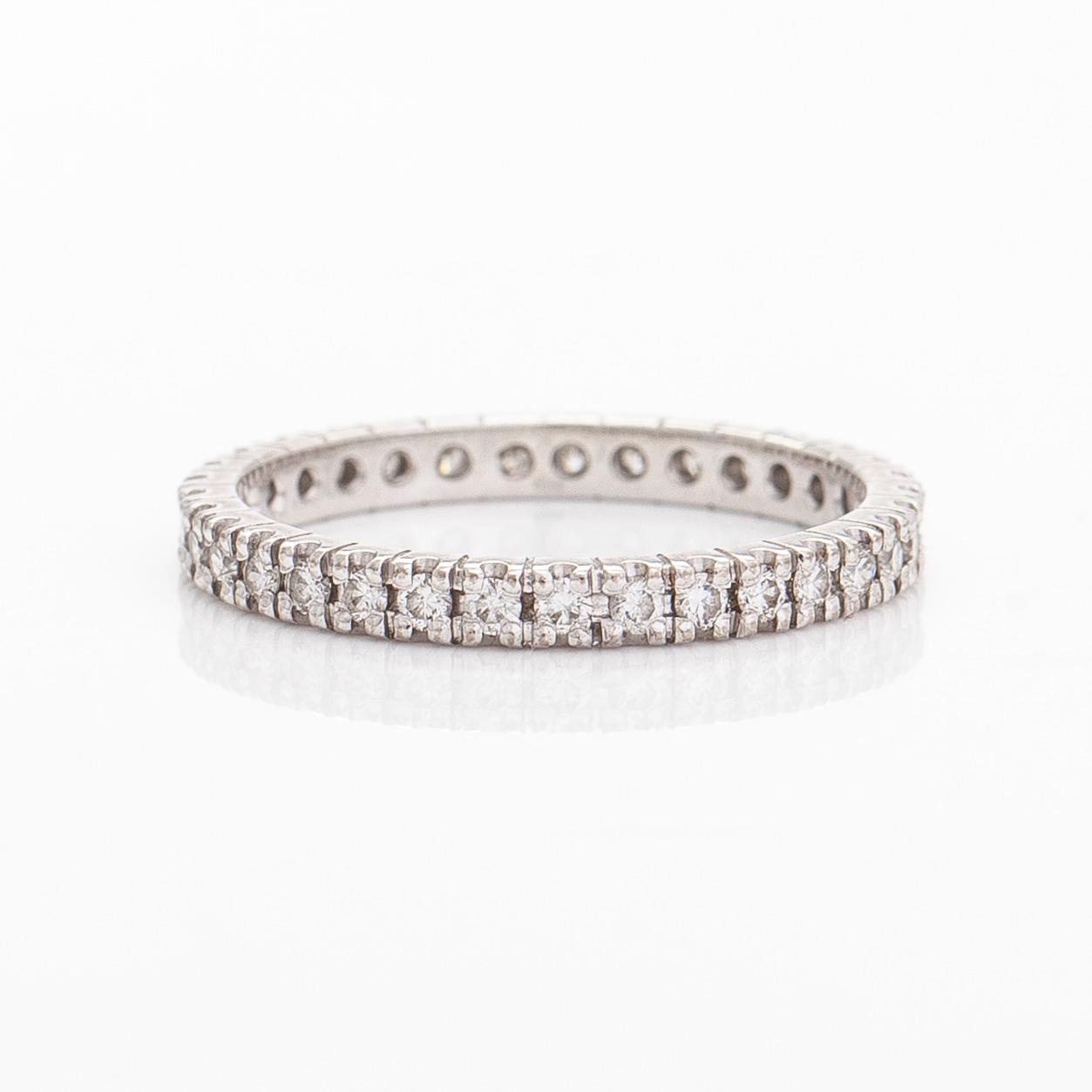 Ring, helalliansring, 14K vitguld med briljantslipade diamanter.